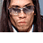 Animated contact sheet of a person with long dark hair wearing sunglasses and a white shirt, displayed in 17 frames across a grid layout with visible text overlays.