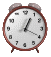 Six identical analog alarm clocks arranged in two of three, each showing 1:20 with black numerals on white faces and brown frames