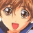A pixelated anime-style character face with wide eyes and open mouth on the left, next to a black background with white text "Anime IM" above smaller cursive "COM" on the right.