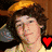 Three side-by-side show a person with curly brown hair in different poses and outfits, each featuring a heart symbol above the head
