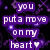 Pixelated text on purple rectangles against a black background with purple particle effects, reading 'you put a move on my heart' with a white heart symbol.
