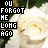 identical pixelated images showing a white rose with green leaves, overlaid with black text reading "YOU FORGOT ME LONG AGO" and small blue dots appearing in the bottom-right corner