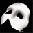White mask with black eye and mouth openings on dark background, partially visible text elements in middle section.