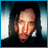 A 48x48 pixel buddy icon split into two frames showing a person's face on the left and stylized text on the right, with blue borders framing both sections.