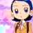 Anime-style character with blue hair and large blue eyes, wearing a brown jacket over a white shirt, against a pink and purple gradient background with 'AnimeIM' text on black.