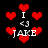 Pixelated red hearts float around white text reading "I <3 JAKE" on a black background.