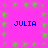 A static image with a bright pink background featuring four instances of the name "JULIA" in blue pixelated text arranged in a , surrounded by scattered green square shapes