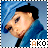 A person with dark hair wears a blue headscarf and blue clothing, with the text 'AKO' visible below.