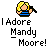 Pixel art icon shows a blonde woman in blue top holding black microphone, with text 'I Adore Mandy Moore!' below.