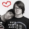 Two people in black-and-white pose with one resting head on the other's shoulder, a red pixelated heart above, and text reading 'PETE HEARTS ANDY' below.