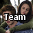 Two people embrace in a forest setting with text overlays reading "Team Edward! Jacob Doesn't Sparkel"