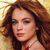 Pixelated close-up of a person with brown curly hair, wearing a red garment and a thin necklace, against a golden-yellow gradient background.