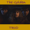 Yellow banner with purple text "The Golden" at top and "TRIO" at bottom, featuring three people in dark clothing against a dark background.