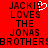 Red background with black pixelated text reading "JACKIE LOVES THE JONAS BROTHERS" and a white heart symbol replacing the 'I' in JACKIE.