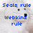 Pixelated image with blue text reading 'Seals rule' and 'webkinz rule' over a light gray background with black pixel clusters.