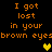 Pixelated orange text on black background reads "I got lost in your brown eyes" with yellow and green heart symbols, animated to alternate between two states.