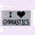 Two side-by-side animated frames of a buddy icon showing "I ❤️ GYMNASTICS" with heart color changing from black to pink on a light purple background.