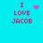 Cyan background with four identical text blocks reading "I LOVE JACOB" in red pixelated font, each paired with a distinct pink pixel art symbol.