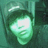 Green-toned pixelated icon with a bright central glow and a curved white highlight on the upper left.