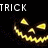 Four pixelated pumpkin faces with glowing yellow eyes and jagged smiles arranged in a , with 'TRICK', '-OR-', and 'TREAT' text above and left
