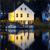 Pixelated static image of a house with illuminated windows reflected in water, set against a dark background with blue and yellow accents.