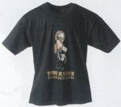 Black T-shirt with a central graphic of Lara Croft holding a pistol, standing above a brown rectangular banner.