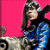 A 50x50 pixel animated buddy icon featuring a character with long dark hair and blue clothing against a pink background, paired with green text reading "Original Icons .com" on a dark green panel.