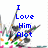 Pixelated blue text reads "I Love Him A lot" over a blurred background with scattered colored pixels.