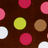 Pixelated static image of multiple colored circles on a dark brown background with no visible text or distinct subjects.