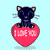 Black cat with yellow inner ears sits on red heart-shaped pillow, displaying "I LOVE YOU" text in white pixelated font against light blue background.