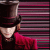 Static pixelated icon of a character in dark clothing with red accents against striped background, likely from Charlie and the Chocolate Factory franchise.