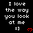 Black background with white text reading "I love the way you look at me =]" and red heart symbols in a pattern