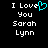 Pixelated text reads 'I Love You Sarah Lynn' with a cyan heart symbol replacing the letter O in 'Love', displayed on black background.