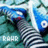 Pixelated image of a character with blue hair and a striped sleeve, next to a black background with white text repeating 'yrowyrowy' and 'chucks' in a pattern.