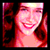 five pixelated images showing a person with long brown hair smiling, with varying crop and color saturation across frames