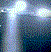 Animated sequence showing a bright light source moving through a dark environment with blue and white tones.