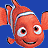 Pixelated orange fish with white stripes and large eyes against a solid blue background, smiling with visible teeth.