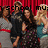 Group of people in formal attire standing against red curtain background with overlaid text.