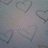Static image with blue background and text elements, featuring a heart-patterned section on the left.
