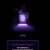 Pixelated purple lamp icon with glowing center on dark background, featuring base and stem details.