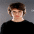 Animated sequence shows a person with brown hair and glasses in black clothing against gray background, transitioning from side profile to front view.