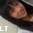 six identical images showing a person with long dark hair and bangs, wearing a white top, with the text "LT" in different colors across the