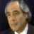 A 48x48 pixel buddy icon split into two sections: a grayscale portrait of an older man on the left and green text reading "Original Icons .com" on a dark green background on the right.