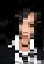 Pixelated static image of a person with light skin tone wearing white and dark clothing against black background.