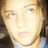Pixelated image of a person with light brown hair and blue eyes, wearing a blue top, with blue text reading 'what' and 'ever' on black backgrounds.