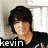 A person with dark hair in a black shirt appears above text reading 'kevin is my lovebug' and an orange ladybug on green foliage.