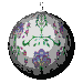 A spherical object with a gray outer ring and white central area displays animated floral patterns in green and purple.