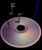 A circular disc with a central hole surrounded by floating musical notes on a black background.