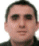 Four pixelated headshots arranged in a , each showing a different man with short dark hair and neutral expressions against a light background