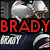 Pixelated image of a football player in silver helmet and dark uniform with red text "BRADY" over top, blue text "& the" on right, and red text "PATS!" at bottom.